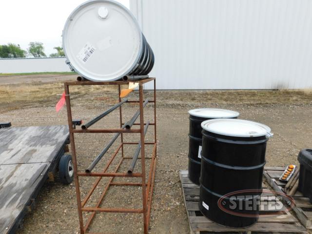 Metal rack w-(4) 55 gallon barrels,_1.jpg